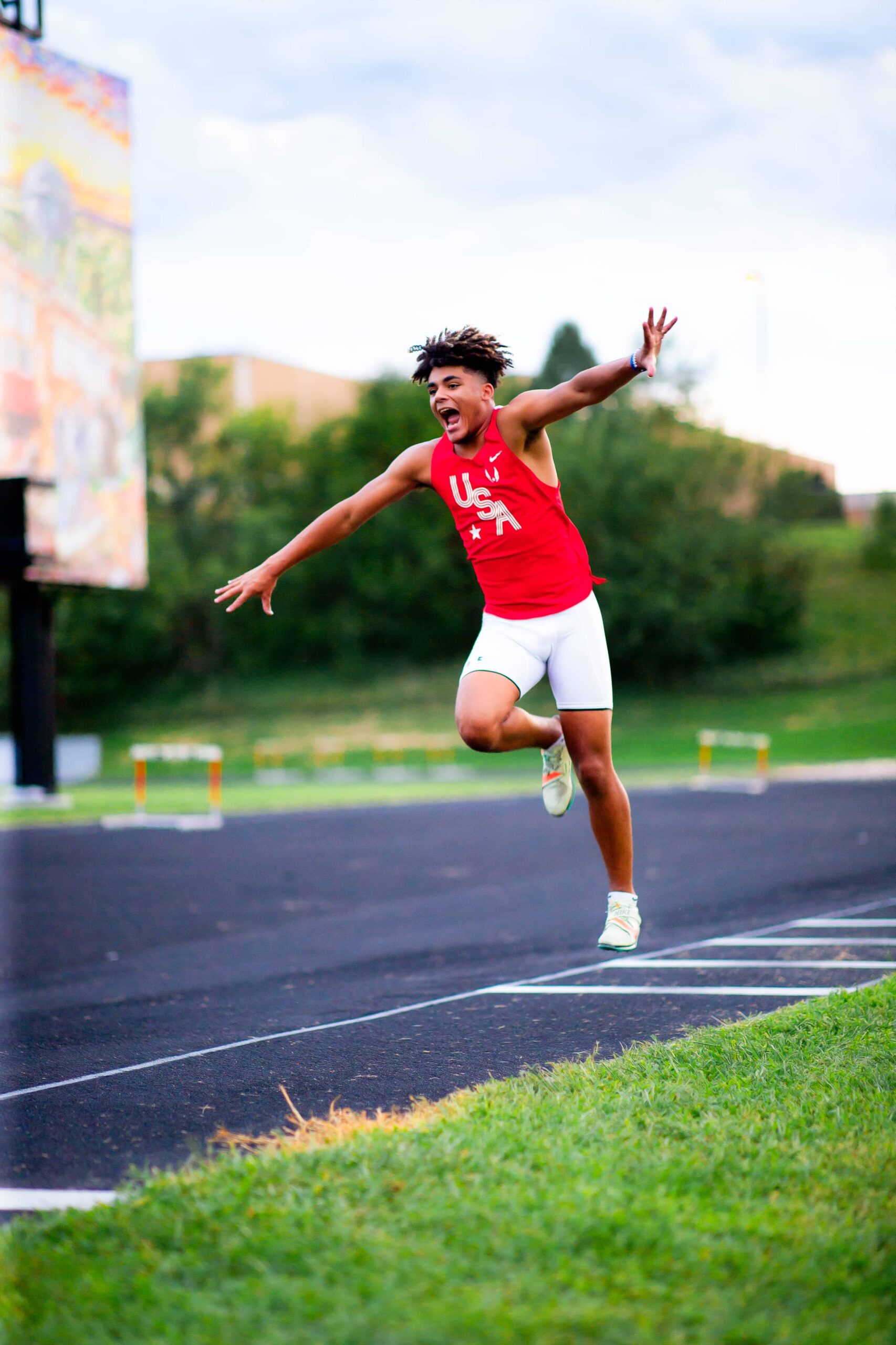 Track and Field Jumping Senior Pictures Omaha