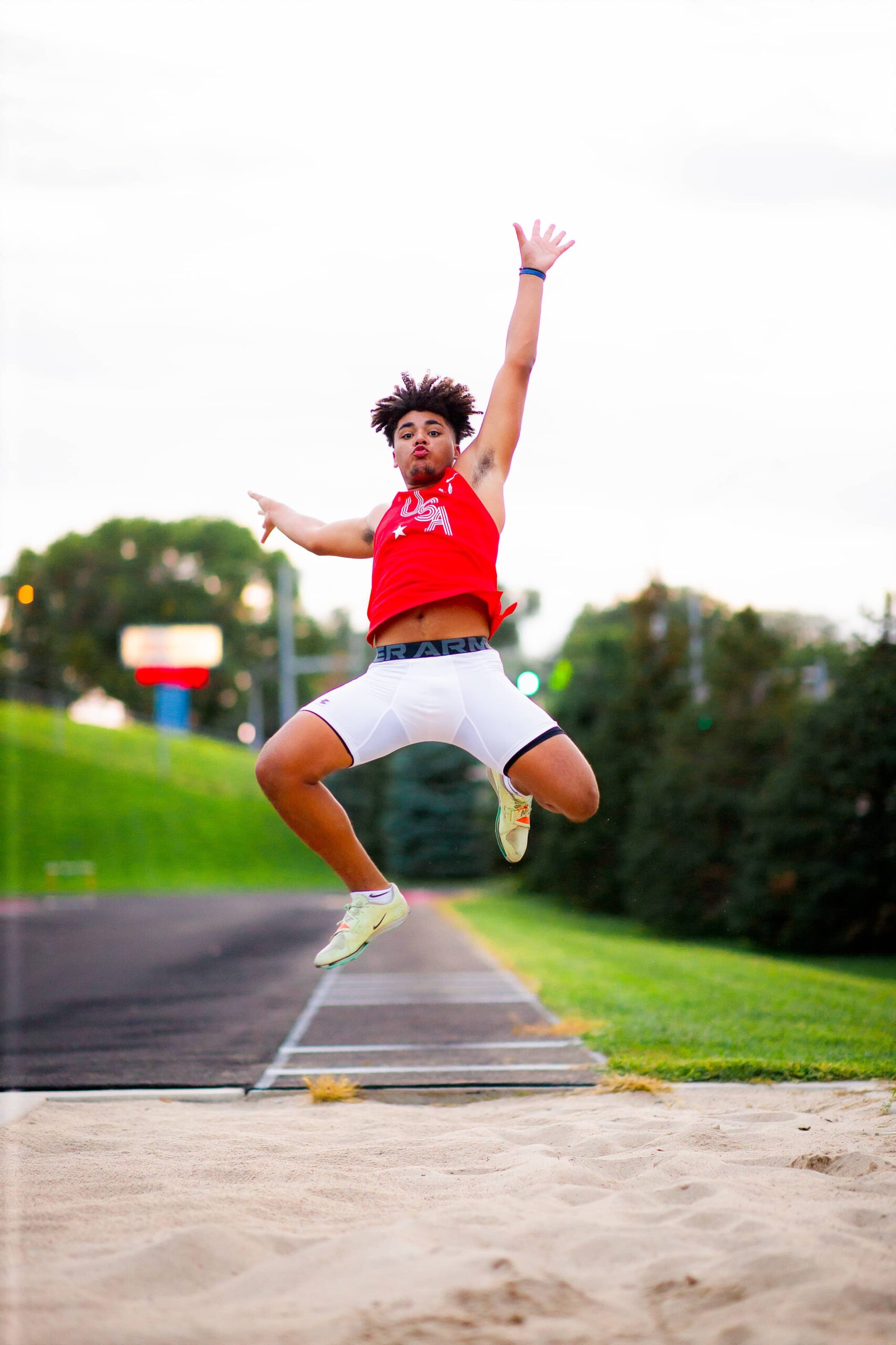 Track and Field Jumping Senior Pictures Omaha